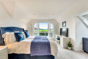 Bedroom One- click for photo gallery